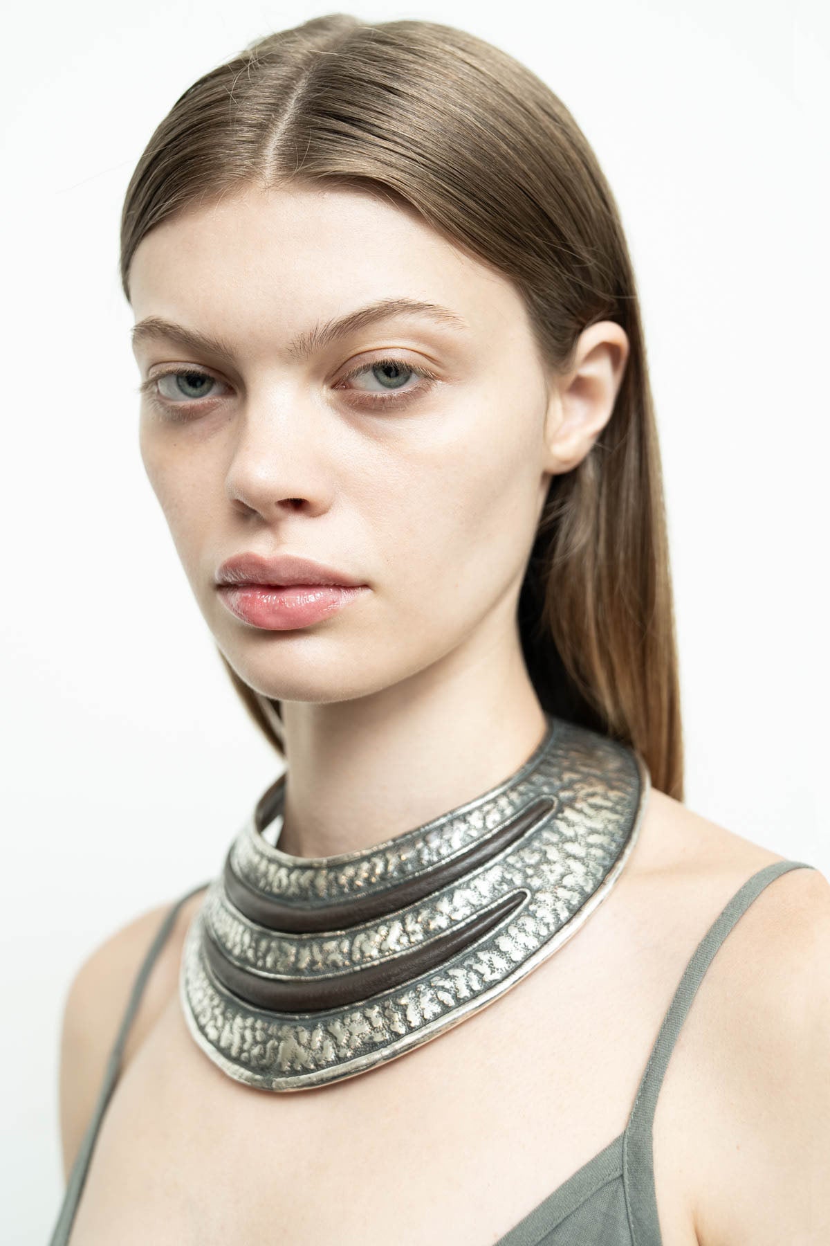 files/NicholasK-NeckPlate-Brown-02.jpg